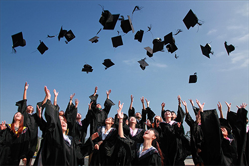 Students celebrating graduation
